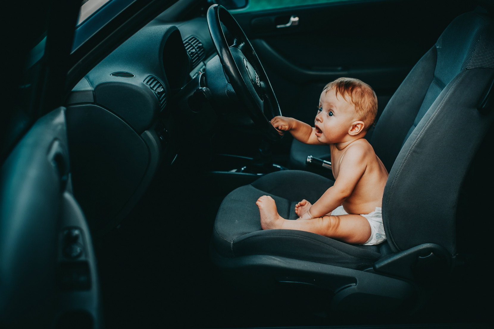 Baby Sitting on Car Seat